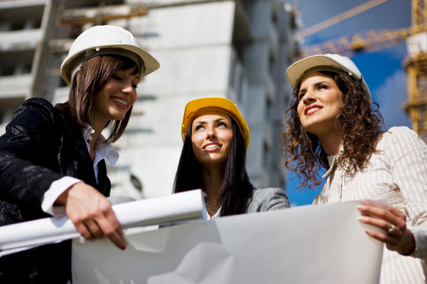Three female architects with blueprint, selective focus, canon 1Ds mark III